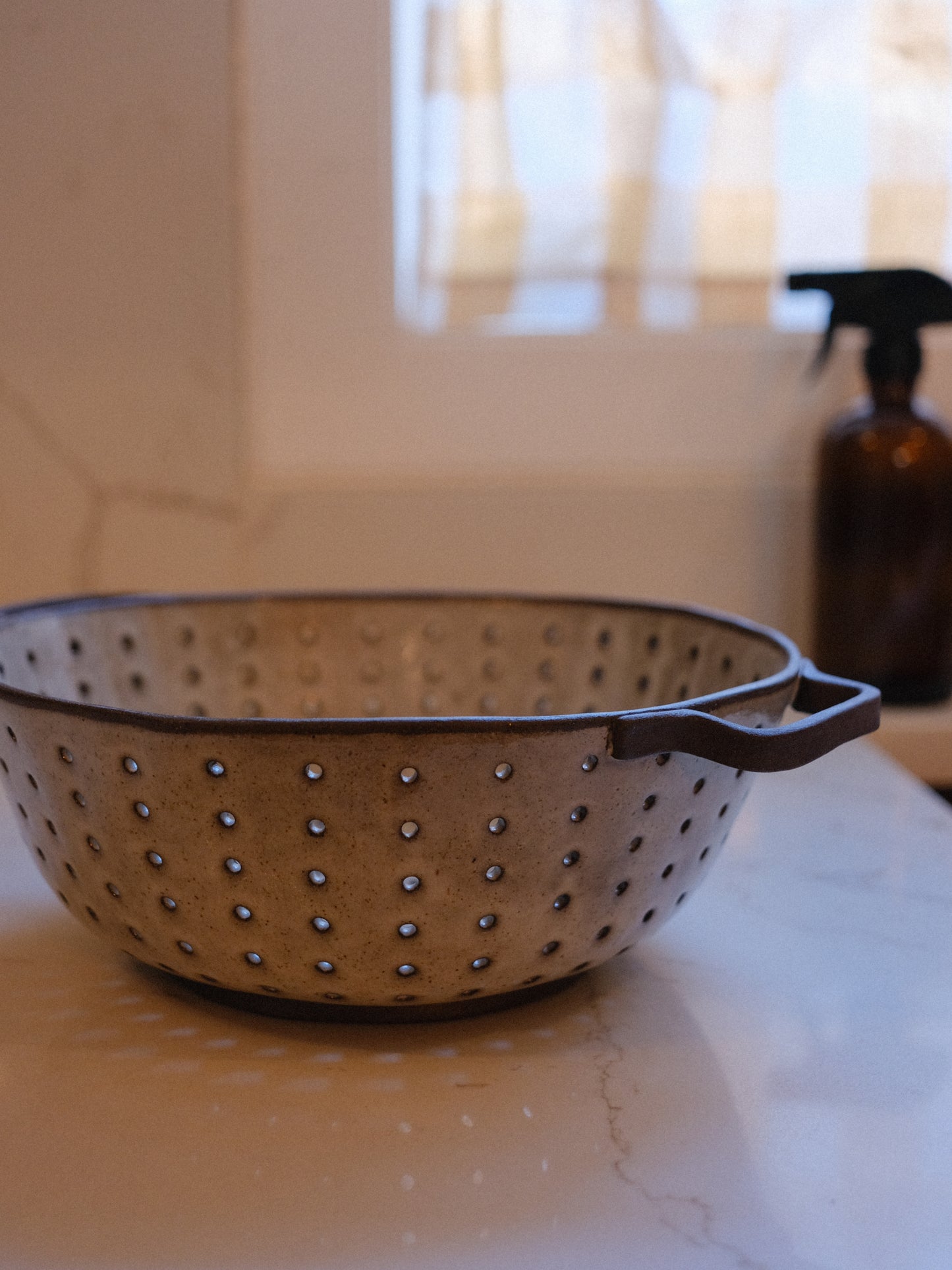 strainer in weathered white